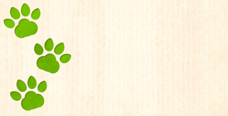 Eco paper texture and animal paws print in paper cut style. Sustainable development of strategy approach to zero waste, responsible consumption. Reuse, renewable resource, eco-friendly conceptの写真素材
