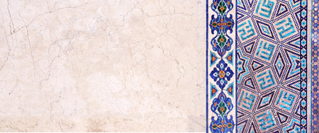 Detail of traditional persian mosaic wall with tile ornament. Horizontal or vertical background with ceramic tile frame. Mock up template. Copy space for textの写真素材