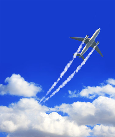Horizontal nature background with aircraft and Jet trailing smoke in sky. Airplane and condensation...
