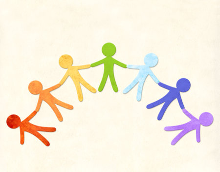 Rainbow color collection. Horizontal background with colorful cutout paper people. Paper human figures holding hands together. Inclusion, tolerance, diversity, acceptance, unity and teamwork conceptの写真素材