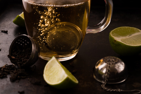 Pouring hot water during tea brewing process