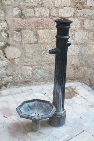 Old water pump in the old town. Kotor, Montenegro.の写真素材