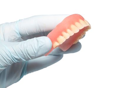 Demountable tooth prostheses in hands of the dentist
