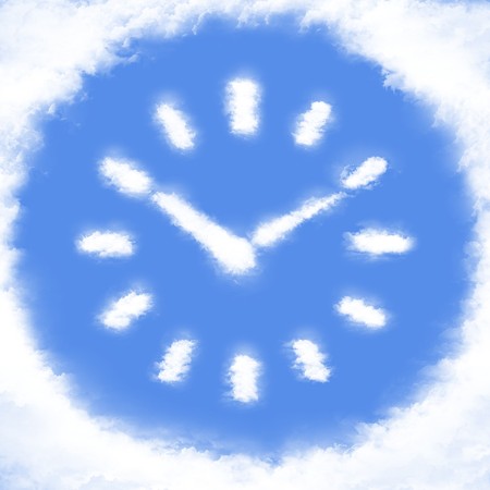 Clouds in shape of Clock faceの写真素材