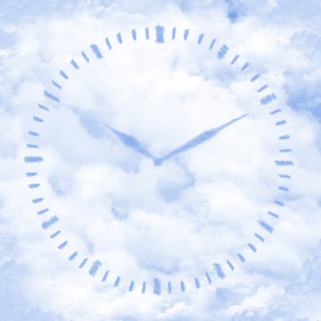 Clouds in shape of Clock faceの写真素材