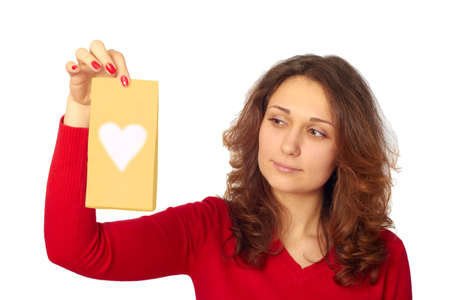 Beautiful young woman getting a pleasant surprise.の写真素材