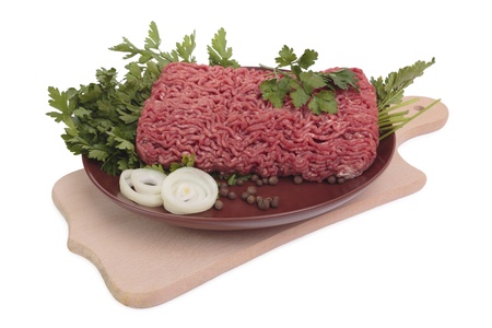 Ground meat with onion and parsley. Isolated on white, with clipping path.