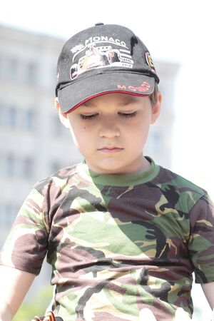 KHARKIV, UKRAINE - MAY 09: Children on  military equipment of Victory Day on Freedom Square on May 09, 2012 in Kharkiv, Ukraine.のeditorial素材