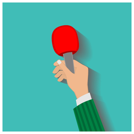 Hand holding a microphone, press conference, vector illustration of a flat icon.のイラスト素材