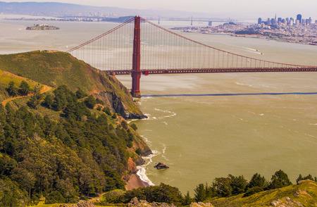 View from the top of the mountain looking over golden gate bridge and the great city of San...
