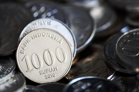 Pile of Indonesian rupiah coins close upの写真素材