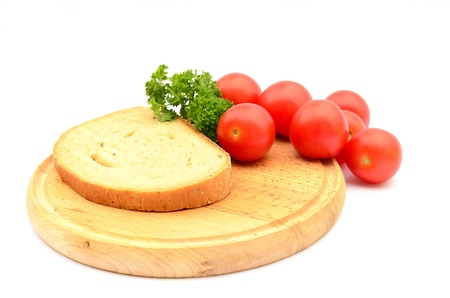 Bread and cherry tomatoesの写真素材
