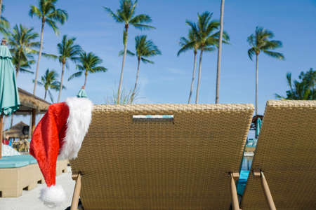 Santa Claus Hat Hanging on Sunbed shot with a Sony a6300の写真素材