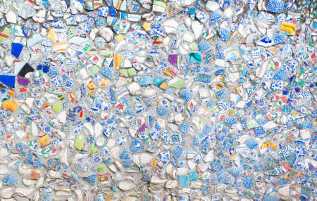 The background image from splinters of a ceramic tile on a wallの写真素材