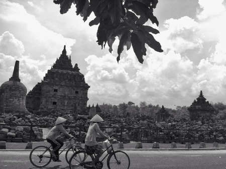 Two farmers passing by the templeの素材
