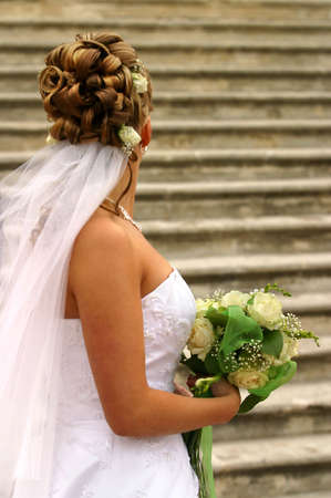 The bride holds a wedding bouquetの写真素材
