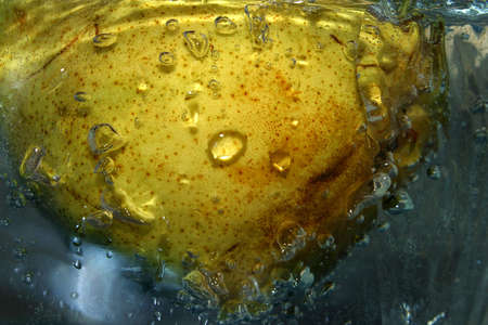 The image of a pear in waterの写真素材