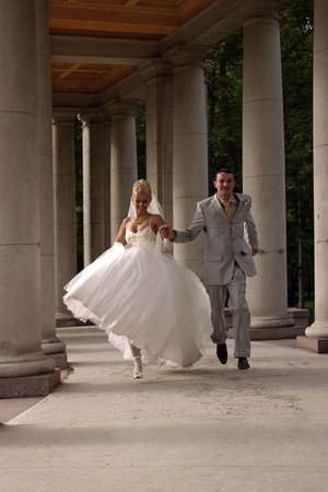The groom and the bride runの写真素材