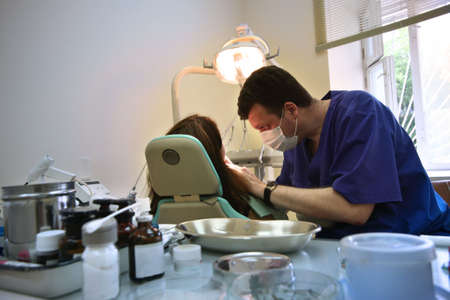 Patient and doctor in stomatological officeの写真素材
