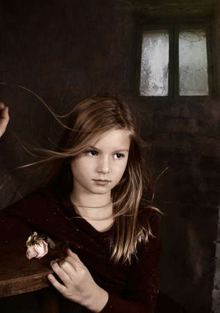 Portrait of the girl with fluttering hairの写真素材