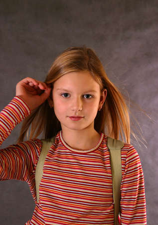 Portrait of the girl with fluttering hairの写真素材