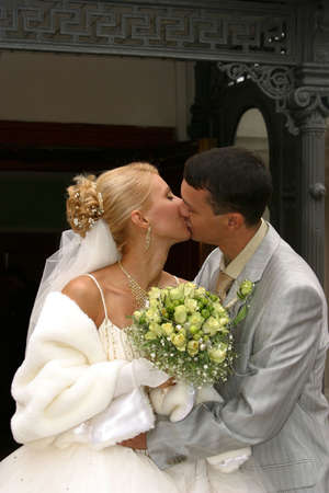 Newly-married couple kissedの写真素材
