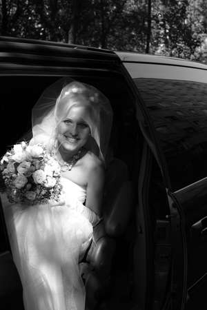 The beautiful bride in a car  b wの写真素材