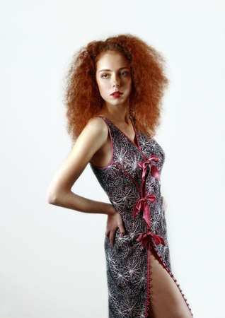 Portrait of the young girl on a white background.の写真素材