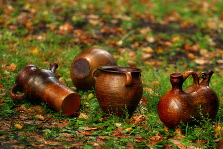 Damp pots on a grassの写真素材