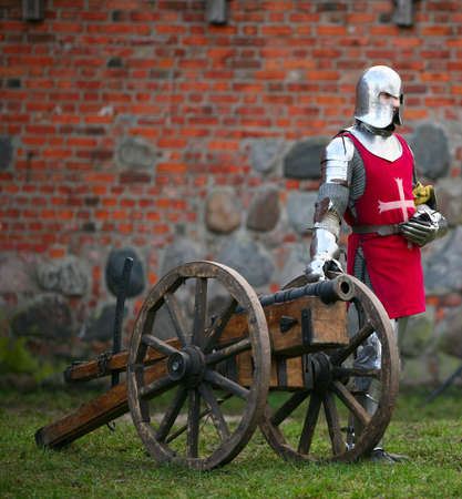The medieval knight and gun. Show in Kaunasの写真素材