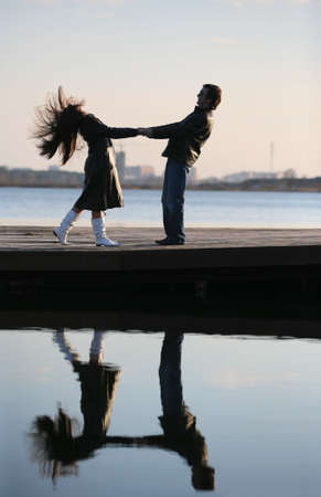 The in love pair walks on the bridgeの写真素材