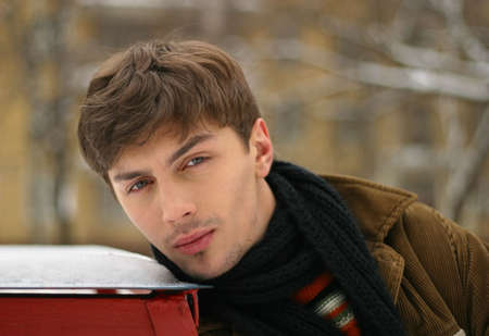 Portrait of the young man in the winterの写真素材