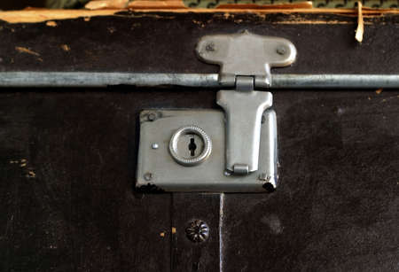 Old suitcase with the closed metal lockの写真素材