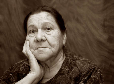 Sad grandmother close-up. Woman in her eighties.の写真素材