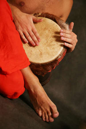 Man playing the nigerian drum in studioの写真素材