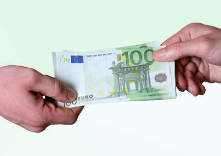 Man's hands hold dollars banknotes money