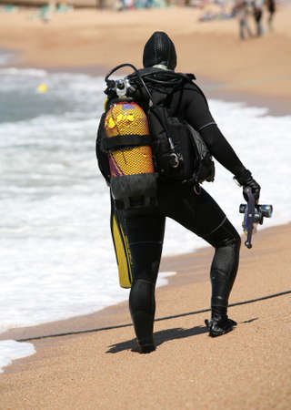 Frogman with aqualungs on a coast of the mediterranean sea. Spainの写真素材