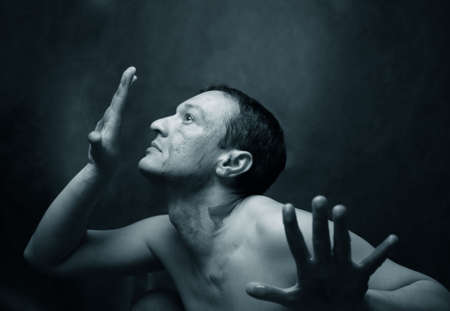 The man on a black backgroundの写真素材