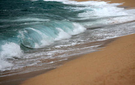 Big wave crashing towards the shore, Beautiful photo. Slightly soft focus.