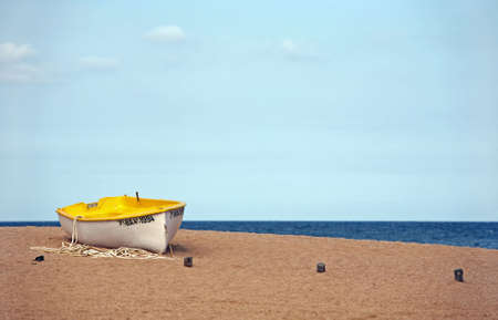 Lonely the boat on seacoast. Spain. Tossaの写真素材