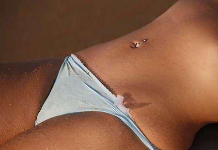 The beautiful girl on a coast of oceanの写真素材