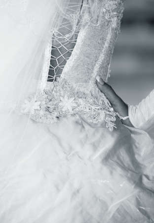 Backside of a beautiful dress of a brideの写真素材