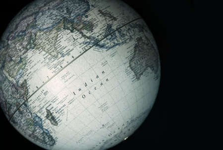 Partial view of a world globe with the spotlight on Indian ocean