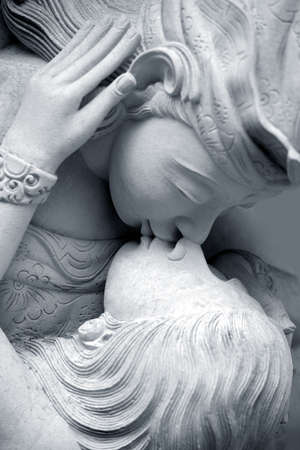 Statue of two in love, found in Balinese to architecture.の写真素材