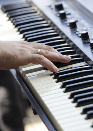 The man plays on an electric pianoの写真素材