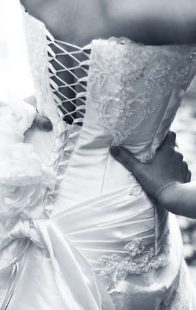 Backside of a beautiful dress of a brideの写真素材