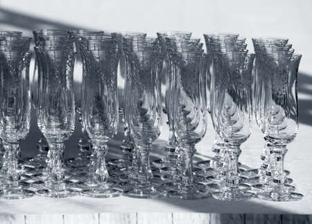 Wine glasses in lines. B/w + blue toneの写真素材