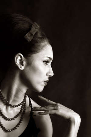 Portrait of the beautiful brunette in studio