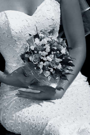The bride holds a wedding bouquetの写真素材
