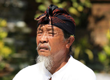 BALI, INDONESIA - OCTOBER 31: Praying father of the bride on the Indonesian wedding. October 31 in Bali, Indonesiaのeditorial素材